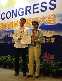 Joël Fisler and Susanne Bleisch holding the ISPRS Catcon 5 Award in Beijing, China Joël Fisler and Susanne Bleisch holding the ISPRS Catcon 5 Award in Beijing, China